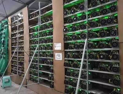 A modern mining farm showcasing rows of powerful mining machines
