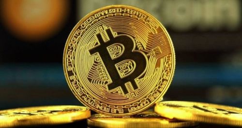 A golden bitcoin coin, symbolizing the value of digital currency.